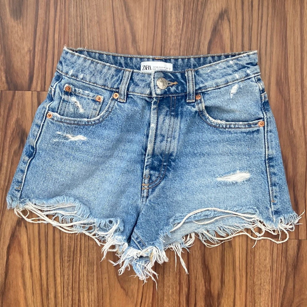 Zara high rise denim cut off shorts. Super cute with boots or casual.